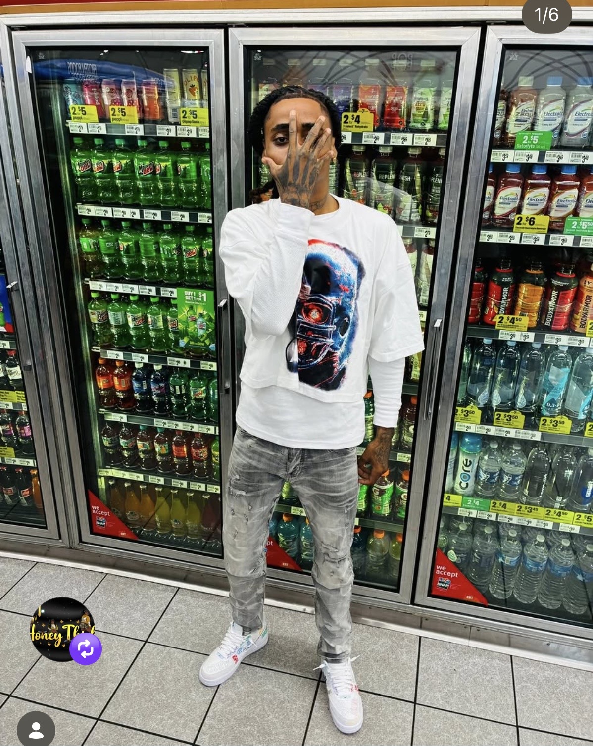KT Mello standing in front of drink coolers